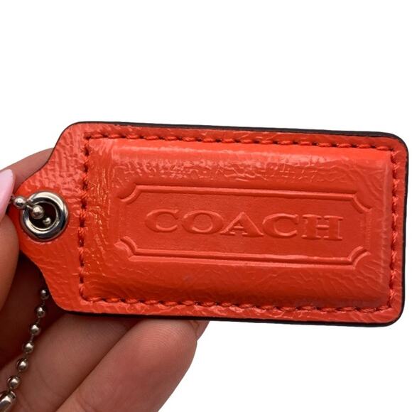 2" COACH Patent Leather Orange Fob Bag Charm Hang tag Hangtag - Picture 1 of 2